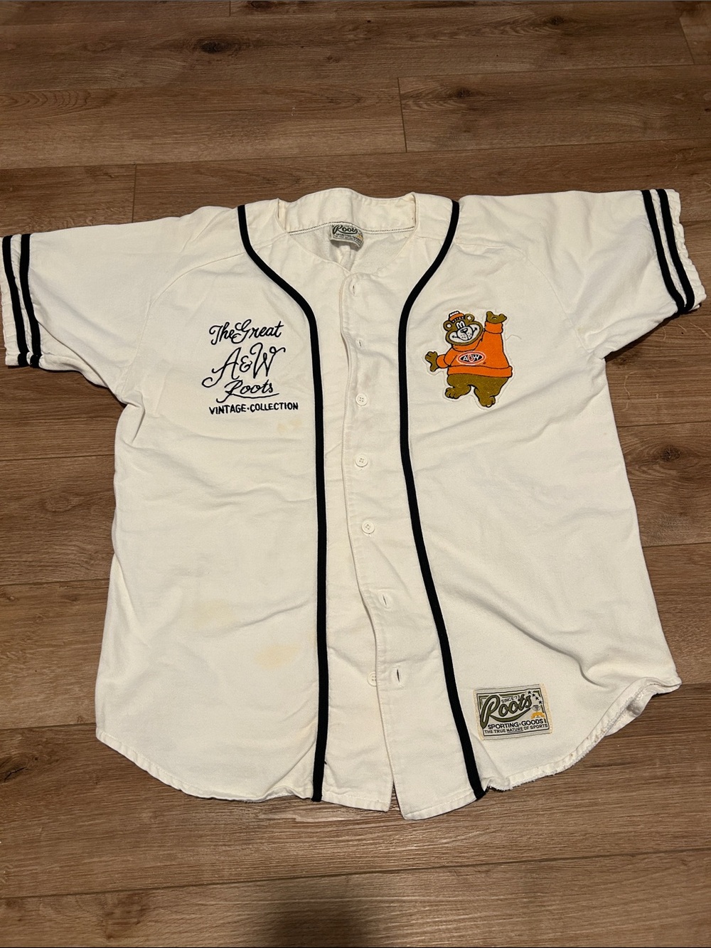 Roots A&W Cream Baseball-Style Button Shirt with Black Trim and Orange Mascot